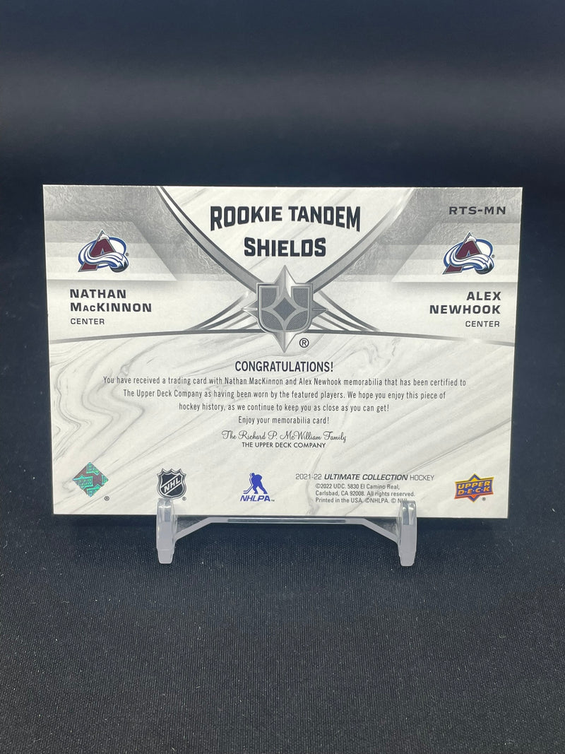 2021 UPPER DECK ULTIMATE - ROOKIE TANDEM SHIELDS - N. MACKINNON / A. NEWHOOK - #RTS-MN - #'D/2 - DUAL RELIC