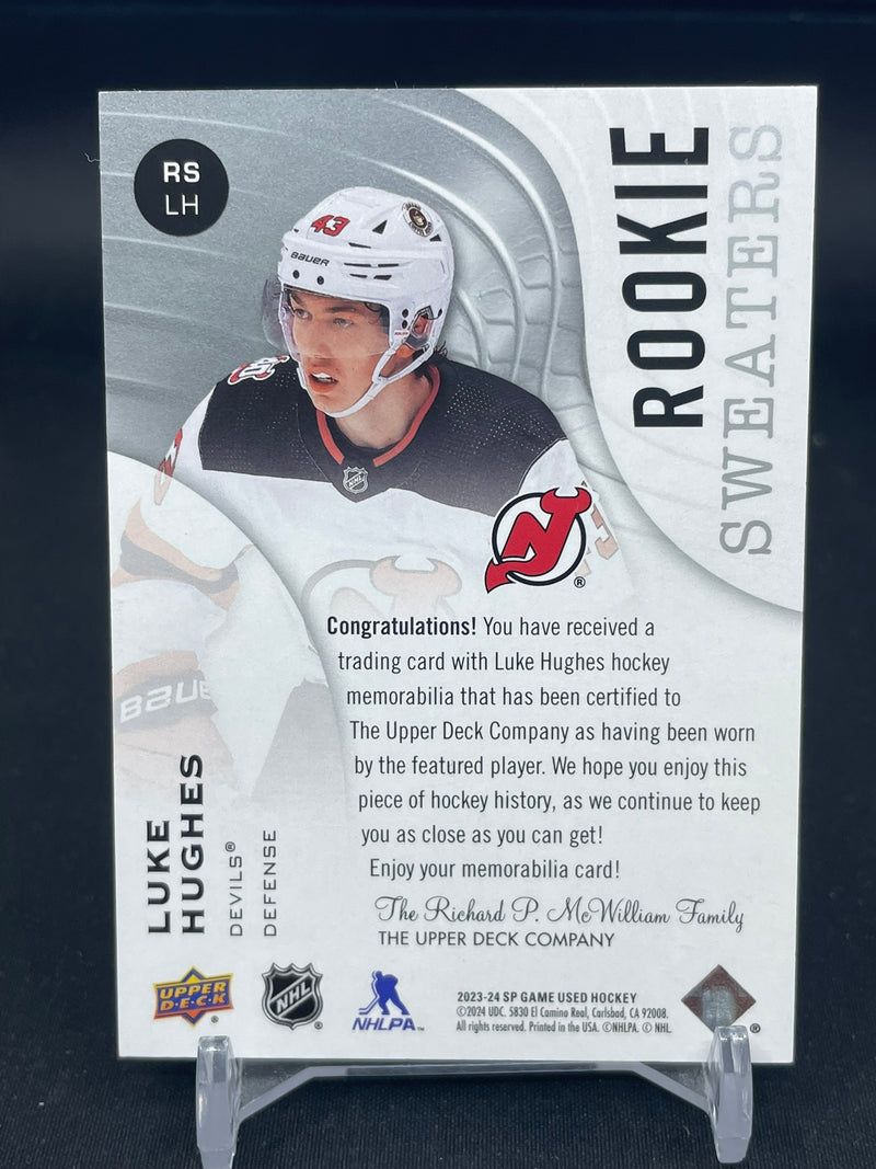 2023 UPPER DECK SP AUTHENTIC - ROOKIE SWEATERS - L. HUGHES -