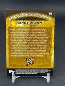 2010 TOPPS WWE - WORLD CHAMPIONSHIP MATERIAL - RANDY ORTON -