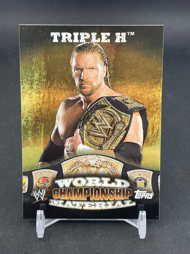 2010 TOPPS WWE - WORLD CHAMPIONSHIP MATERIAL - TRIPLE H -