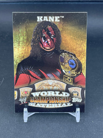 2010 TOPPS WWE - WORLD CHAMPIONSHIP MATERIAL - KANE - #W11