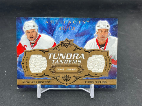 2008 UPPER DECK ARTIFACTS - TUNDRA TANDEMS - N. LIDSTROM / C. CHELIOS - #TT-CL - #'D/100 - DUAL RELIC