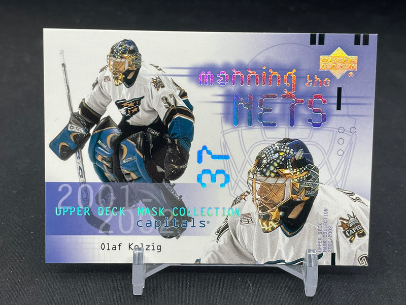 2002 UPPER DECK MASK COLLECTION - MANNING THE NETS - O. KOLZIG -