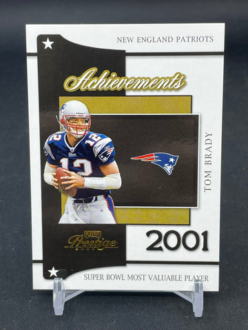 2004 DONRUSS PLAYOFF PRESTIGE - ACHIEVEMENTS - T. BRADY - #A-8