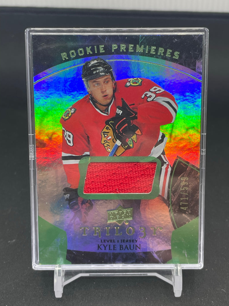 2015 UPPER DECK TRILOGY - ROOKIE PREMIERES - K. BAUN - #118 - #'D/599 - RELIC - RC