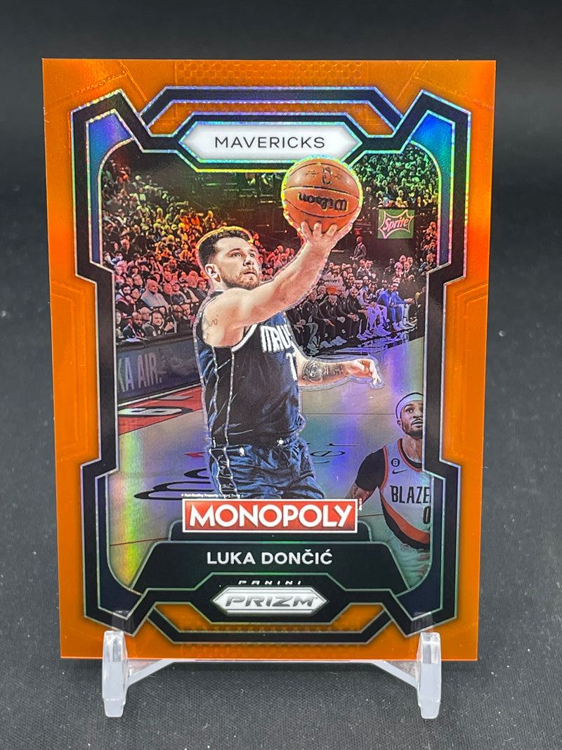 2023 PANINI PRIZM MONOPOLY - ORANGE PRIZM - L. DONCIC - #22 - #'D/124