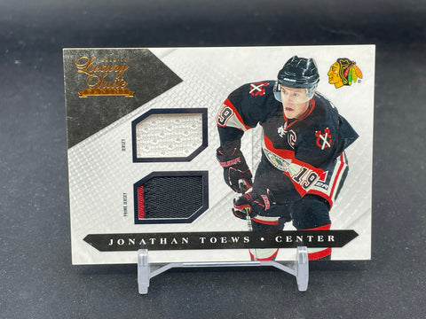 2010 PANINI LUXURY SUITE - J. TOEWS - #16 - #'D/150 - DUAL RELIC
