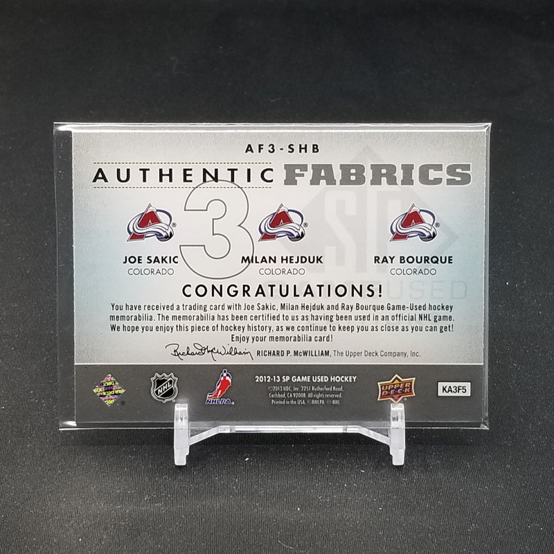 2012 UPPER DECK SP GAME-USED - TRIPLE AUTHENTIC FABRICS - J. SAKIC / M. HEJDUK / R. BOURQUE -