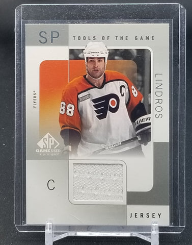 2001 UPPER DECK SP GAME-USED - TOOLS OF THE GAME - E. LINDROS - #EL - RELIC