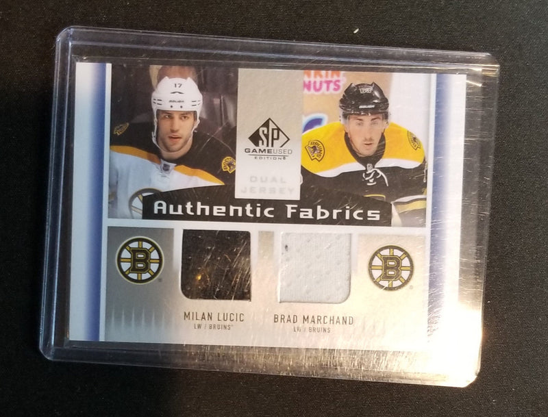 2013 UPPER DECK SP GAME USED - AUTHENTIC FABRICS - M. LUCIC / B. MARCHAND -