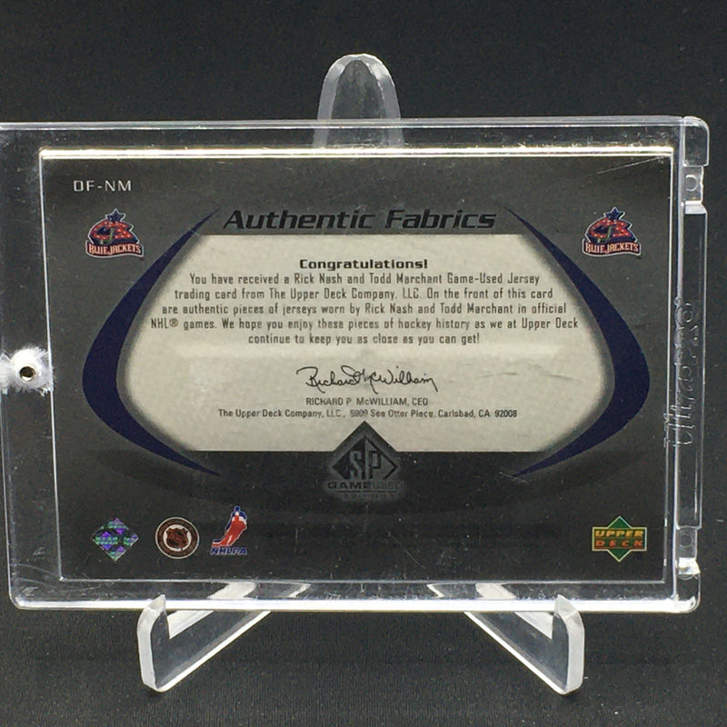 2004 UPPER DECK SP GAME USED - AUTHENTIC FABRICS - R. NASH/ T. MARCHANT - #OF-NM - #'D/99 - DUAL RELIC