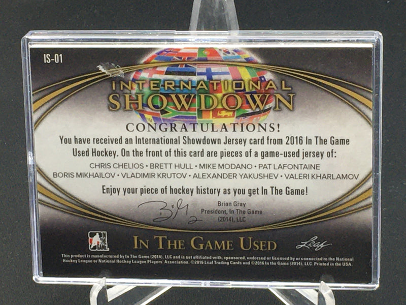 2016 LEAF IN THE GAME USED - INTERNATIONAL SHOWDOWN - C. CHELIOS/ M. MODANO/ B. MIKAILOV/ A.YAKUSHEV/ B. HULL/ P. LAFONTAINE/ V. KRUTOV/ V. KHARLAMOV - #IS-01 - #'D/20 - JERSEY